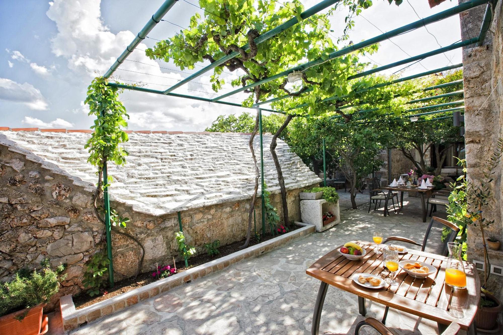 Paradise Stone Apartments Bol Kamer foto